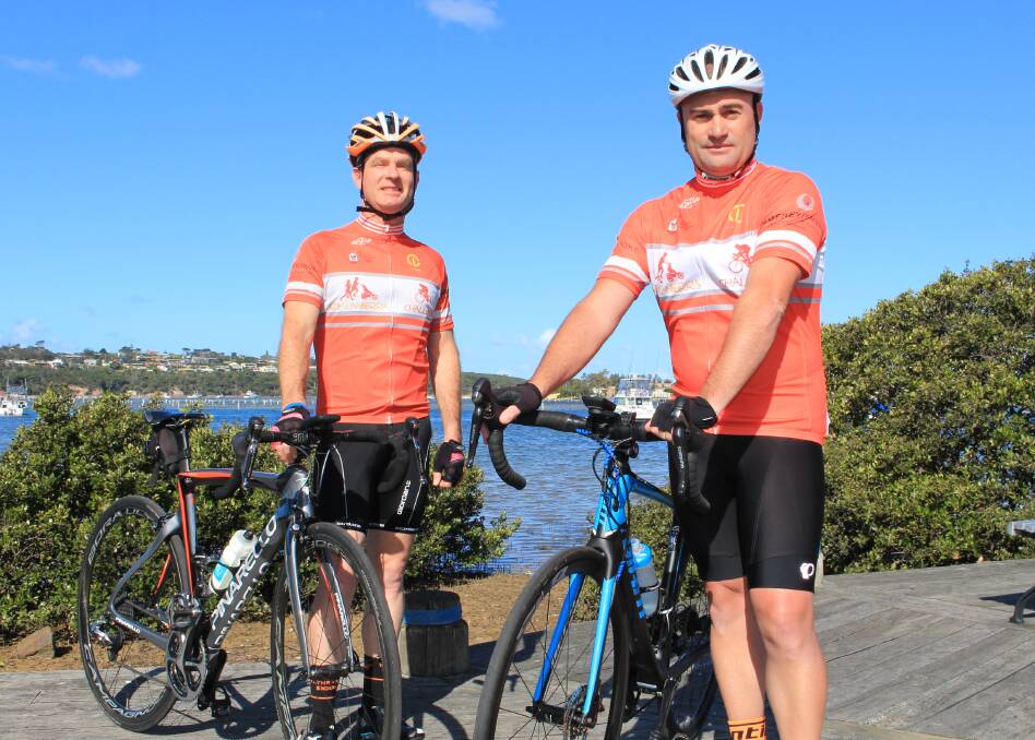 Riding for Ronald: Merimbula cyclists Darren Stevens and Trent Pool are jumping on their bikes in an effort to raise much needed funds for the Ronald McDonald House Canberra. Picture: Melanie Leach
