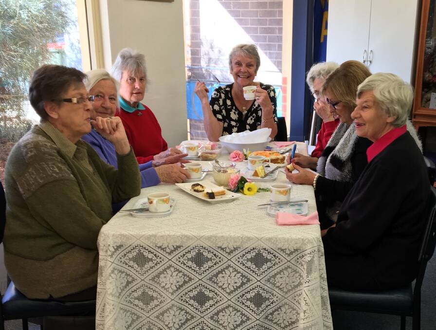 Delicious: Imlay House Auxiliary members enjoy a fun afternoon at their Pambula Cream Tea fundraiser last week. 