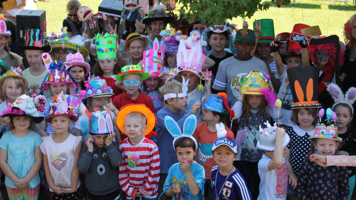 Easter excitement: Wolumla Public School children show off their incredible and creative bonnets at their Mad Hatters' Parade on Friday, April 7. Picture: Albert McKnight