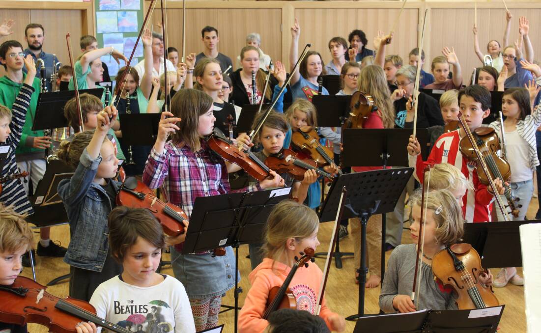 A large group of kids enjoying the annual South Coast Music Camp in Bega which saw  over 100 orchestral and band musicians gather for a week of music and fun. 