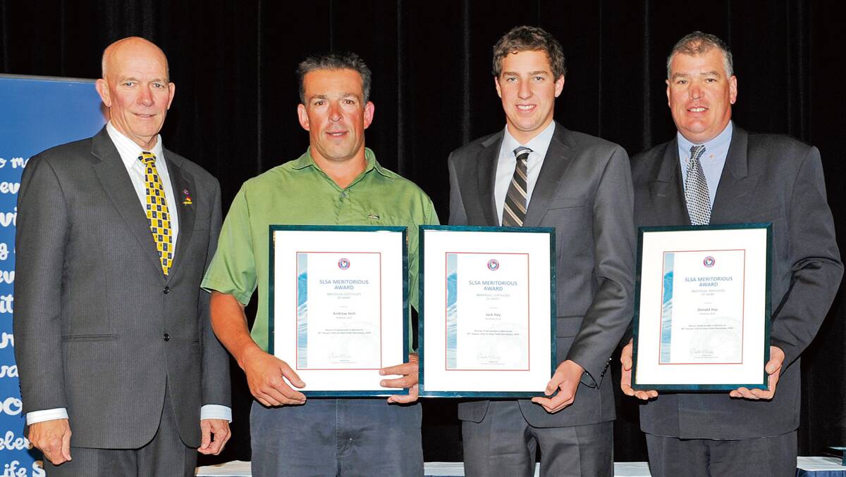 • Surf Lifesaving Australia president Graham Ford presents Certificates of Merit to Pambula Surf Lifesaving Club members for their brave actions in saving two surfers in January, Andrew Holt, Jack and Don Hay, all of Pambula Beach. 